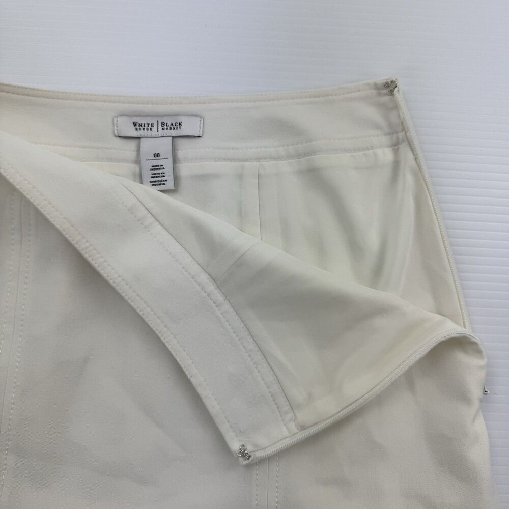 White House Black Market Ecru Ivory Flounce Hem Skirt Size 00 Lined Mini - Picture 3 of 10